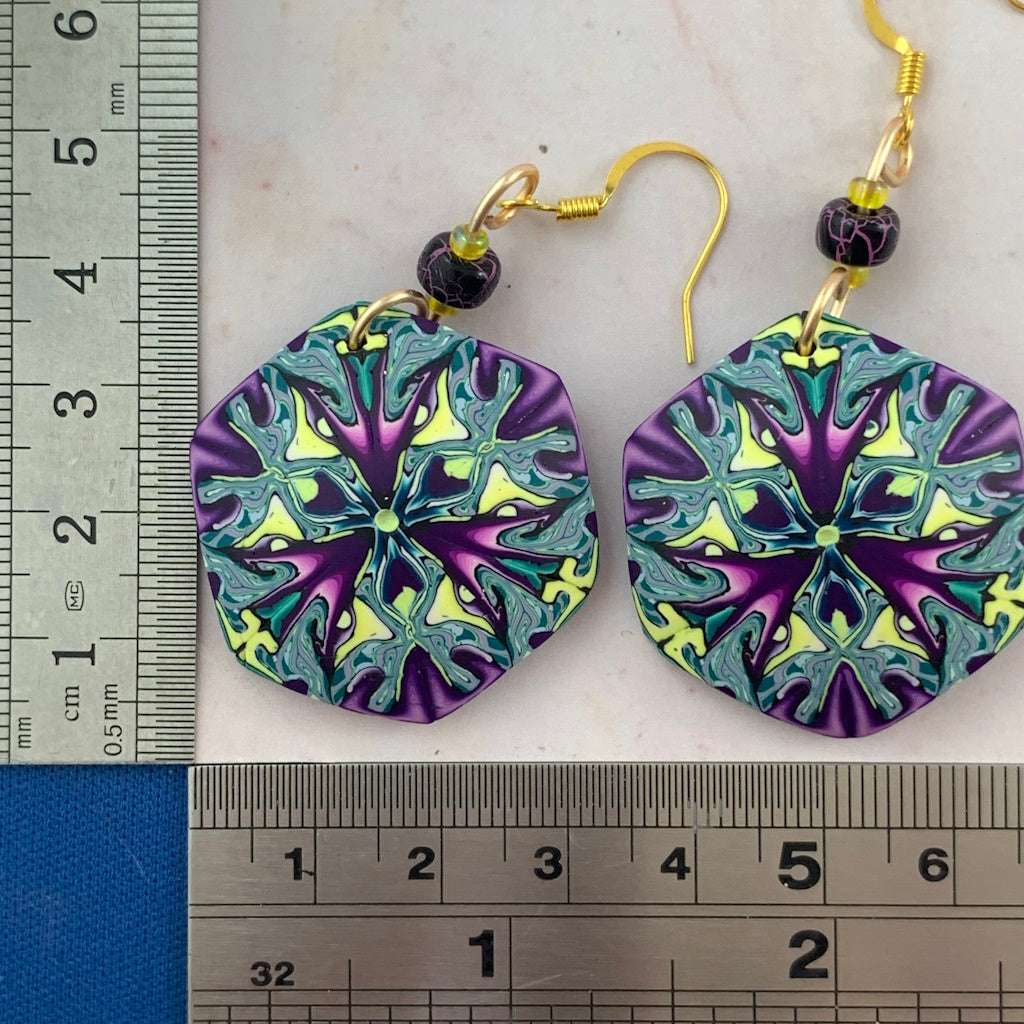 Contemporary studio jewellery wearable art earrings with size reference, Rennique Studio handmade polymer clay statement earrings