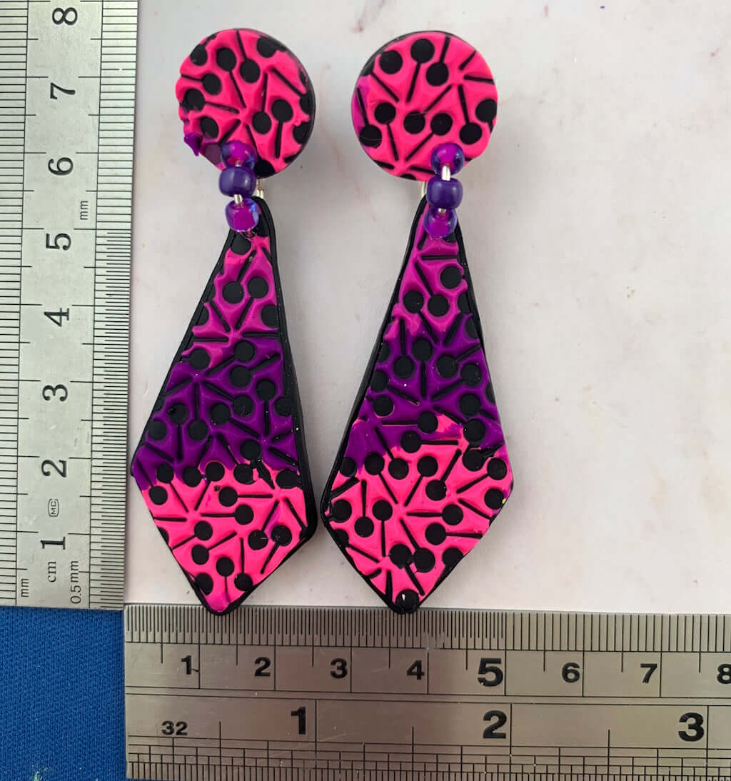 Pink and purple designer earrings with size reference, handmade polymer clay statement earrings by Rennique Australia