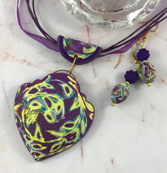 Purple heart swirl feature pendant and earrings