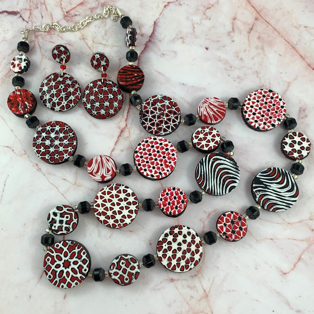 Red black and white geometric long necklace and earrings