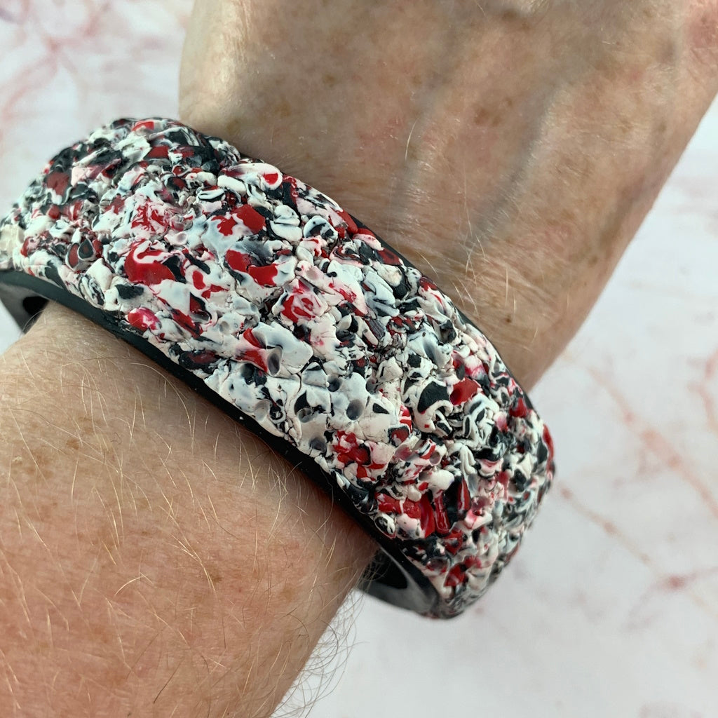 Unusual textured bangle in red, black and white