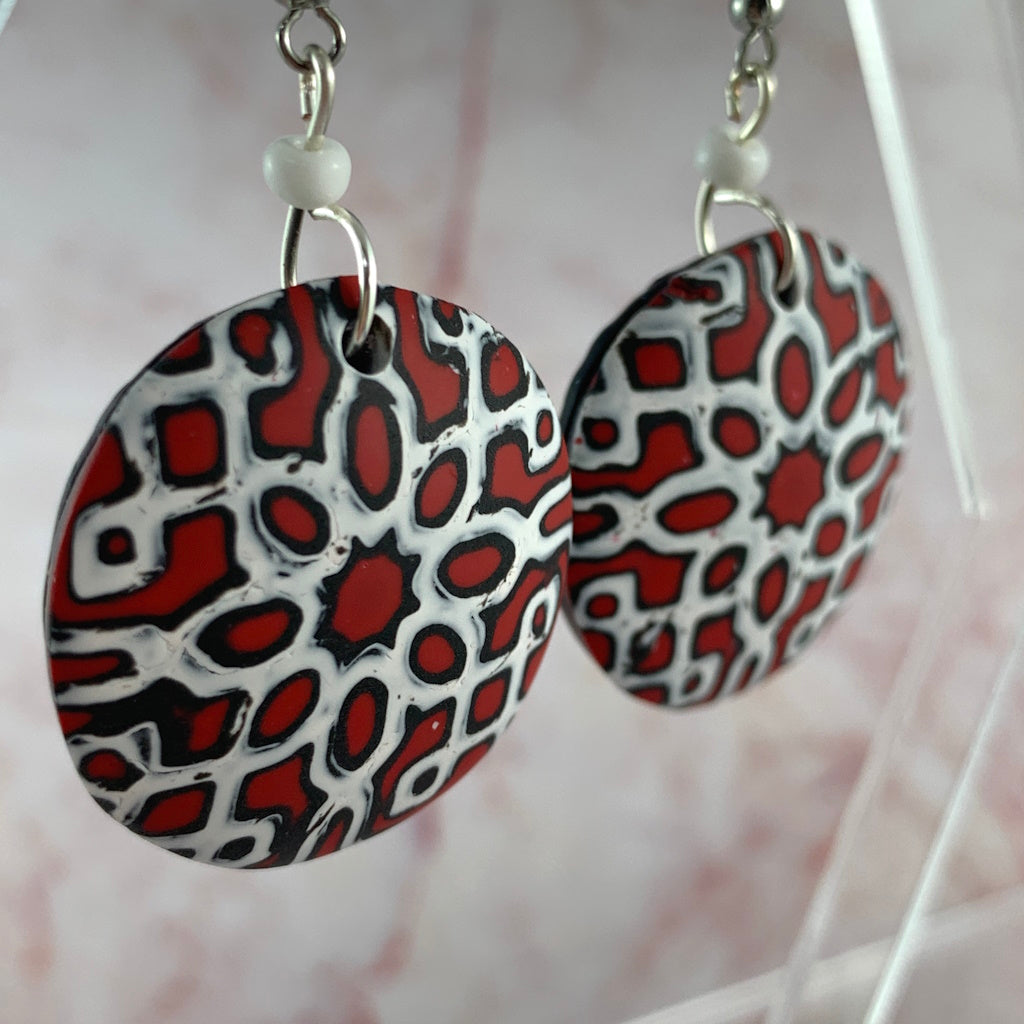 Ladies earrings in Red, black and white geometric pattern