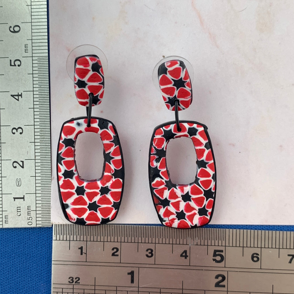 Pendant and earrings in red,white and black