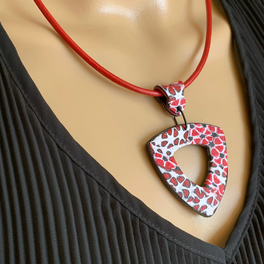 Pendant and earrings in red,white and black
