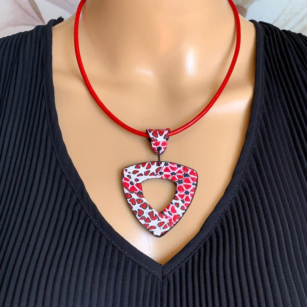 Pendant and earrings in red,white and black