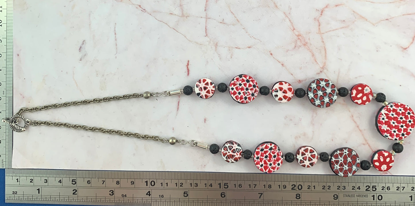 Ladies red,black and white necklace