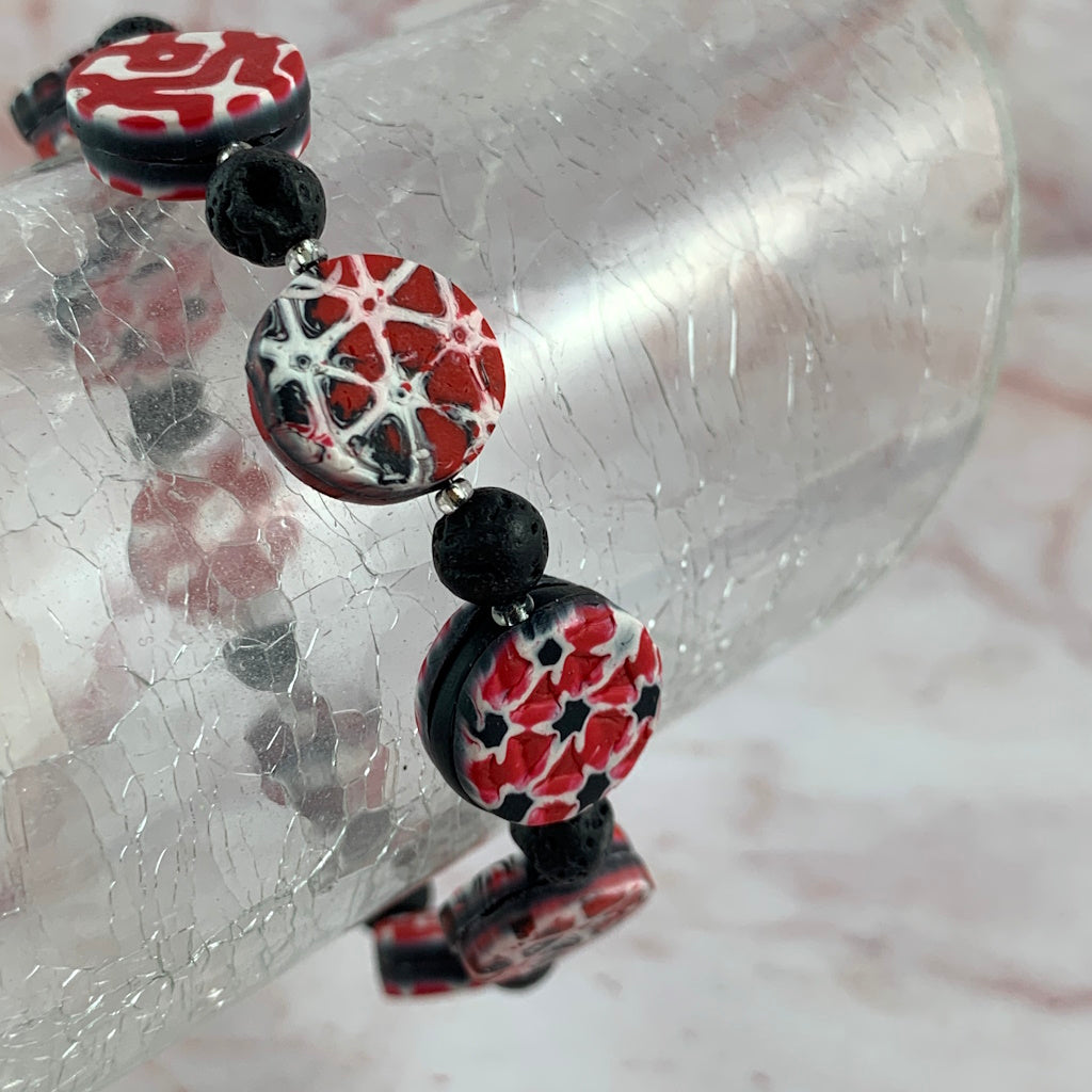 Bracelet in Red, black and white geometric pattern
