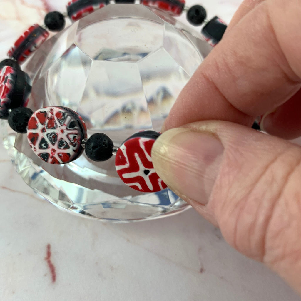 Bracelet in Red, black and white geometric pattern