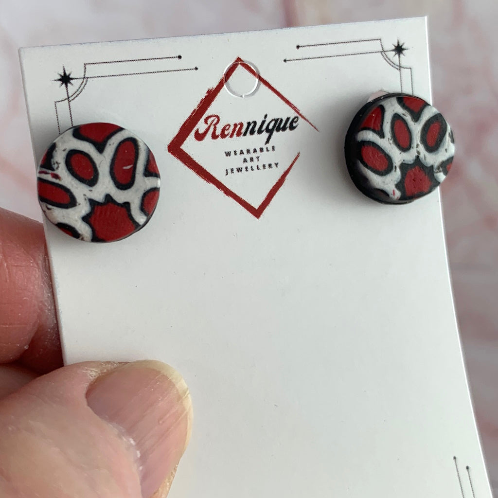 Striking Stud earrings in Red, Black and White.