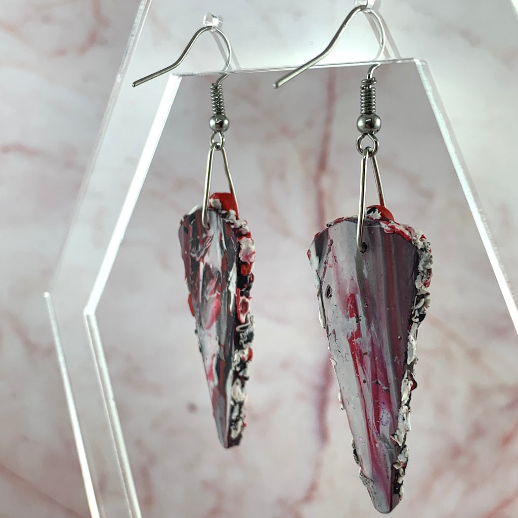 Textured earrings in red, white and black