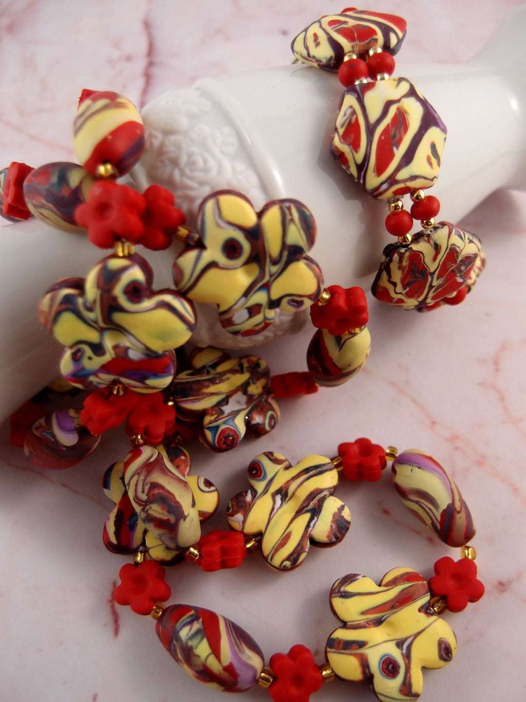 red and yellow necklace set