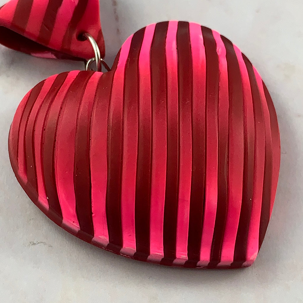 Artisan handmade heart pendant in pink and red tones, ideal fashion jewellery gift for women.