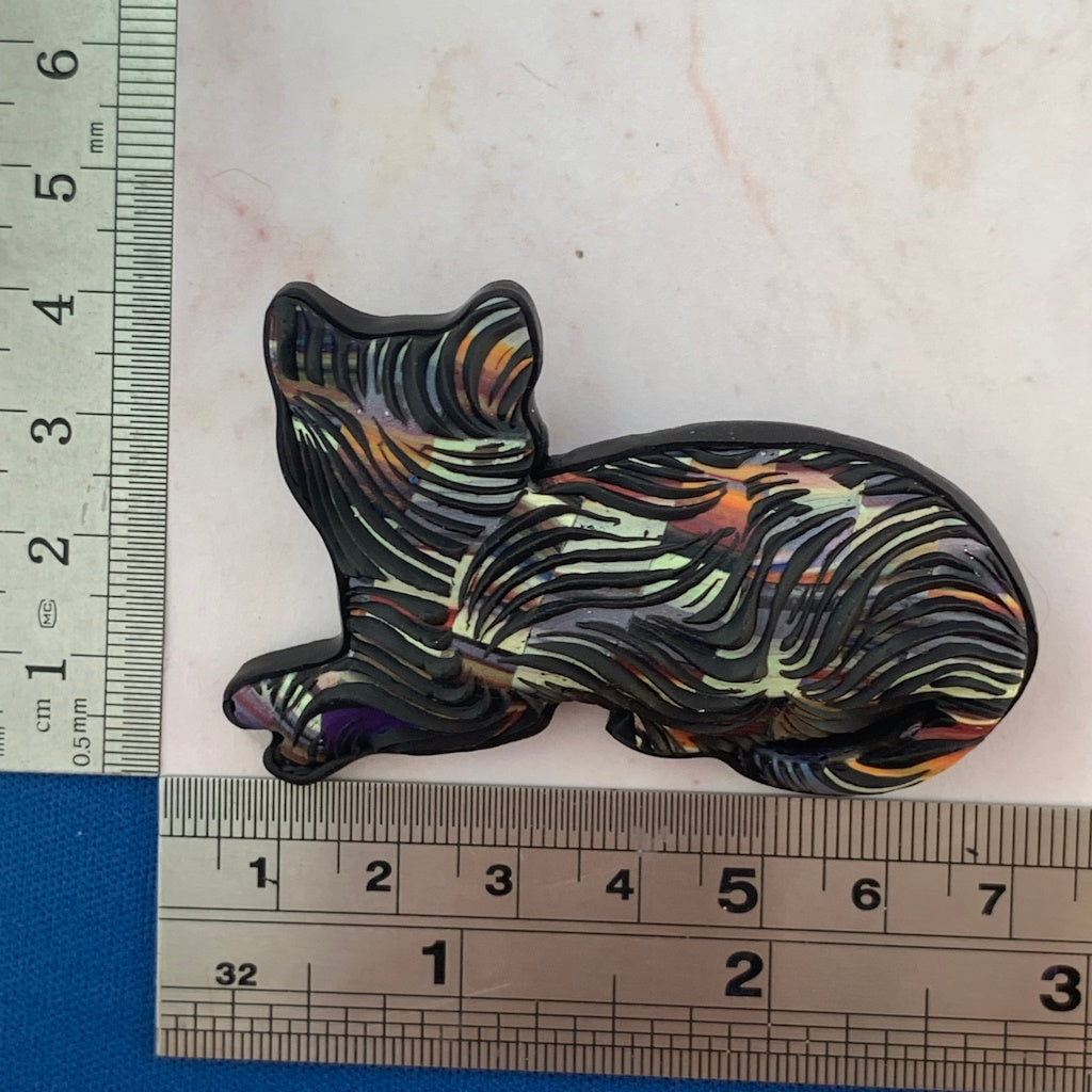 Handmade black kitty cat brooch with textured fur-like surface and rounded shape, artisan jewellery Australia