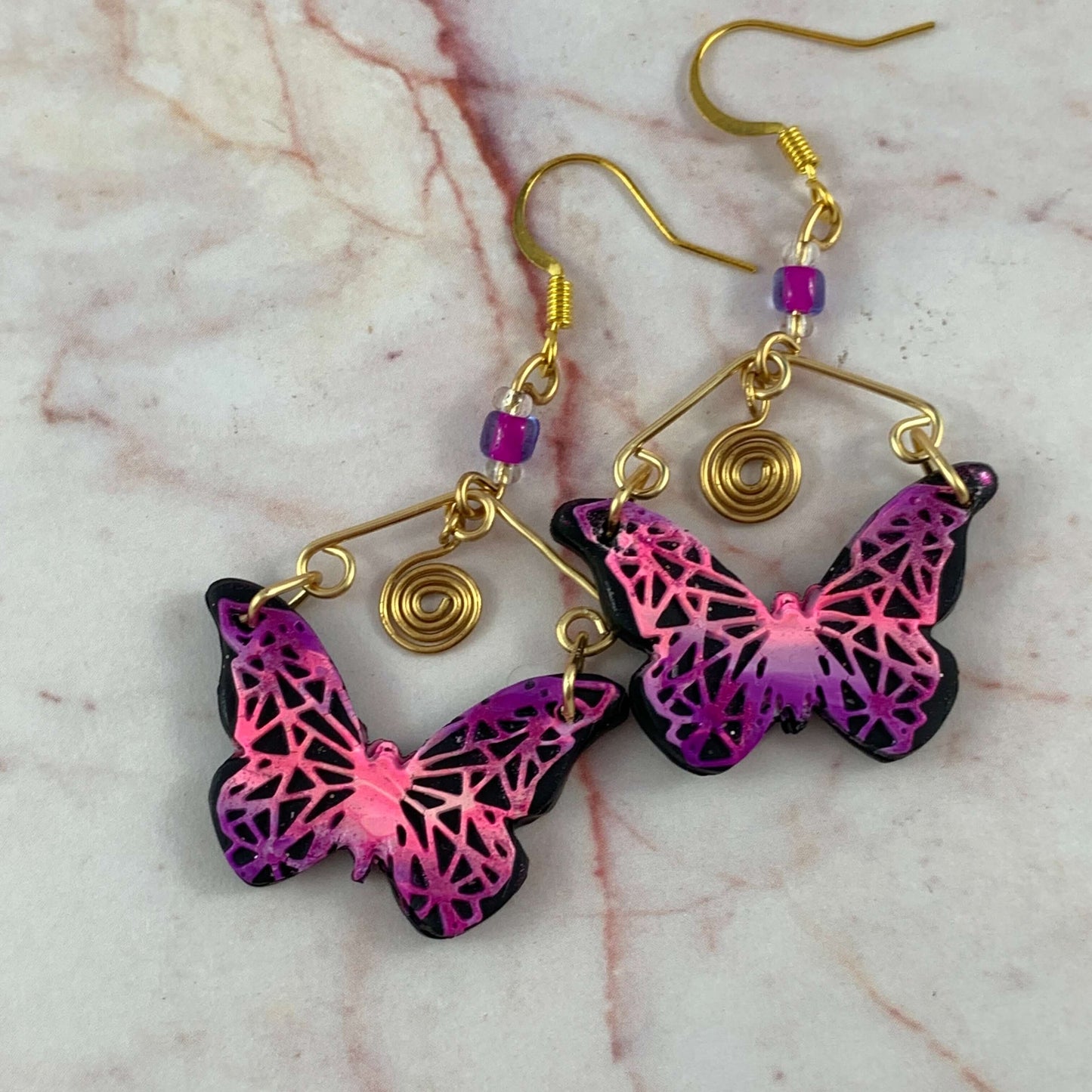 Butterfly dangle earrings with decorative wirework hooks, pink purple handmade fashion jewellery
