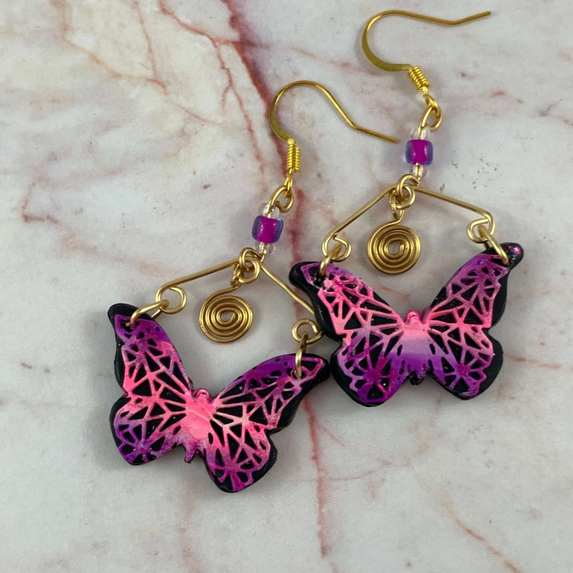 Butterfly dangle earrings with decorative wirework hooks, pink purple handmade fashion jewellery
