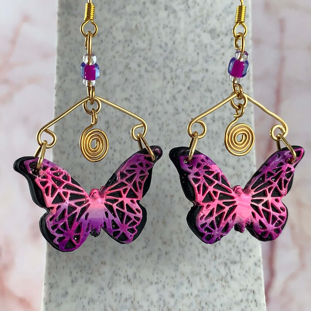 Pink purple butterfly earrings with geometric cut design, lightweight handmade fashion jewellery gift for women