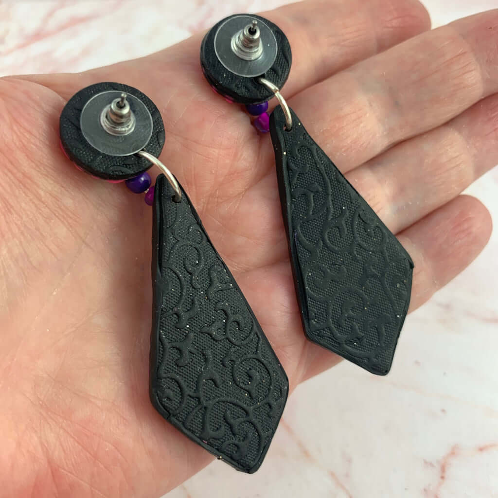 Pink and purple designer dangle earrings with bold textured pattern, contemporary wearable art jewellery by Rennique