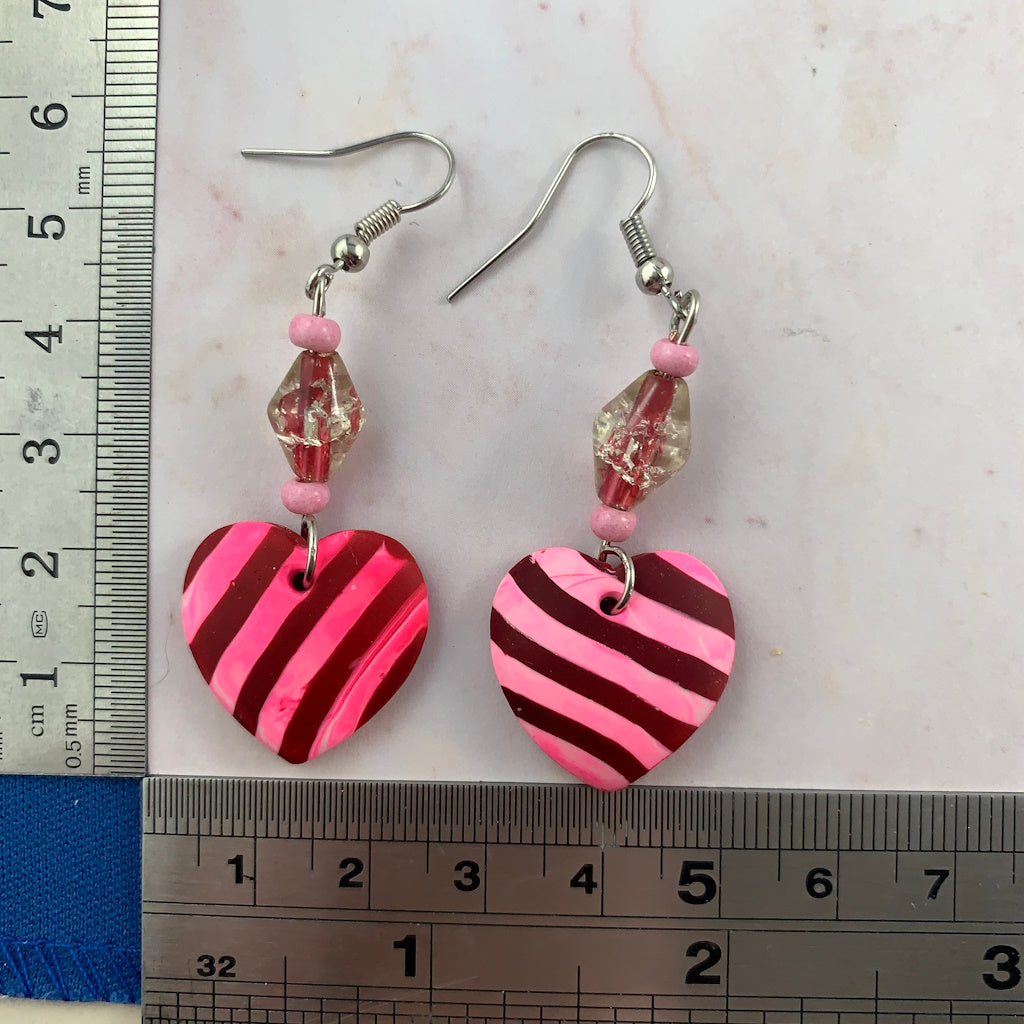 Bold handmade pink and red striped matching earrings, artisan statement jewellery gift for women by Rennique.