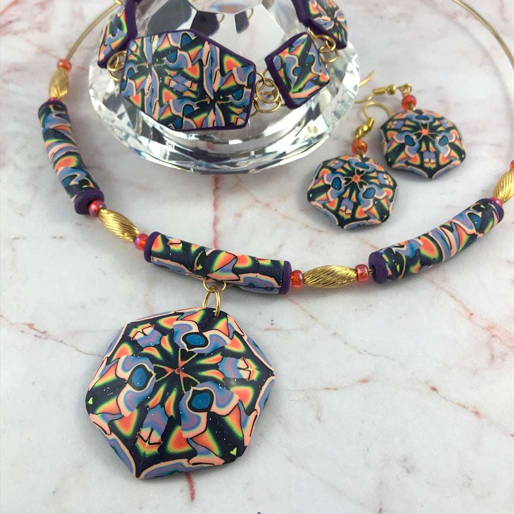 Handmade Exotic Colour Combo Changeables jewellery set front view with geometric pendant, earrings, and bracelet by Rennique.