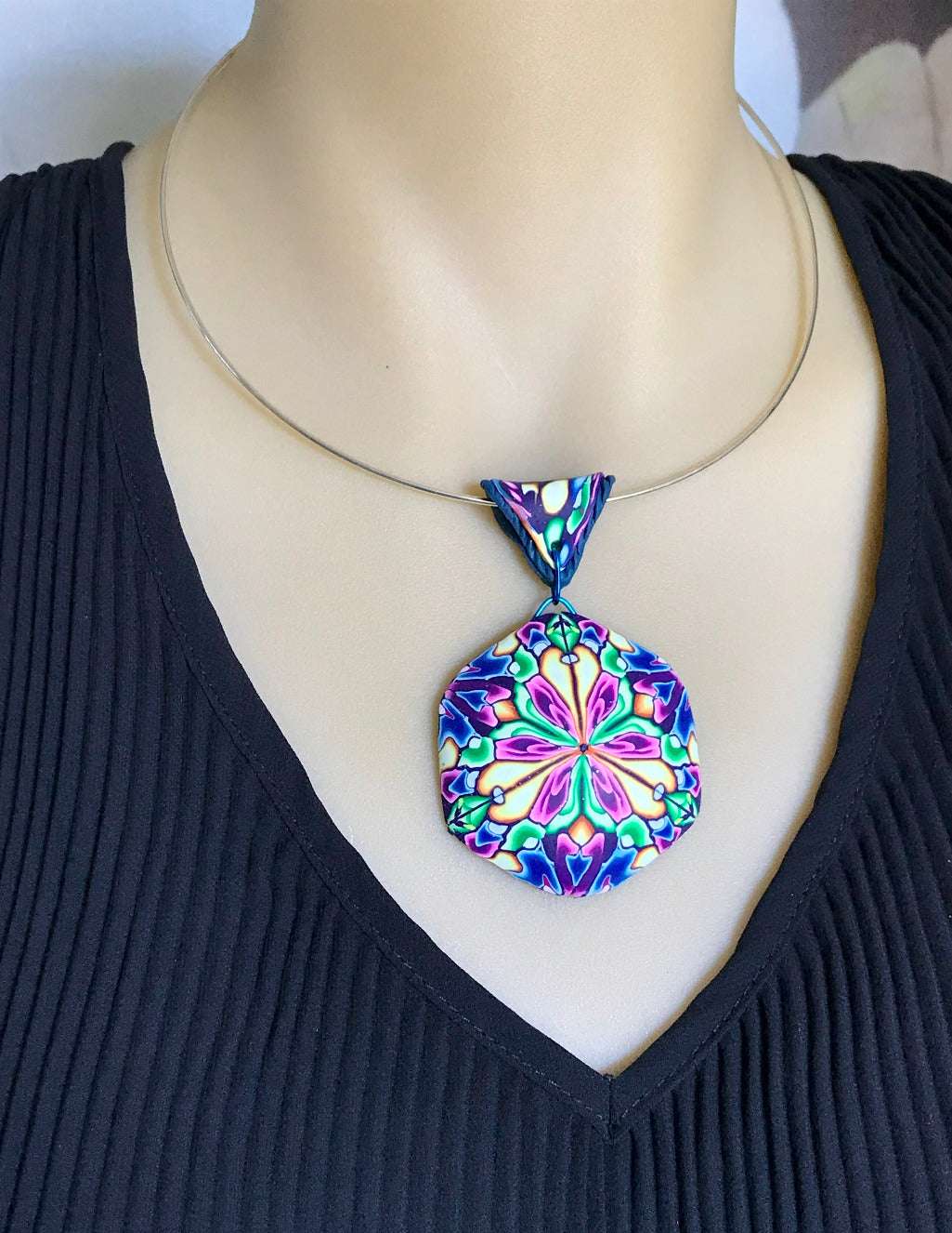 Bold floral feature pendant