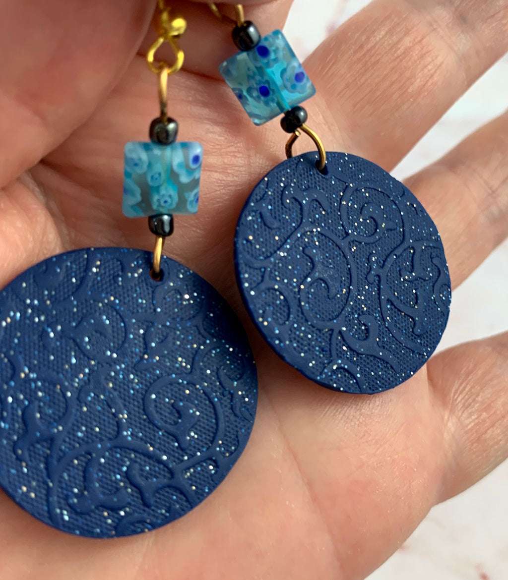Round blue and yellow earrings