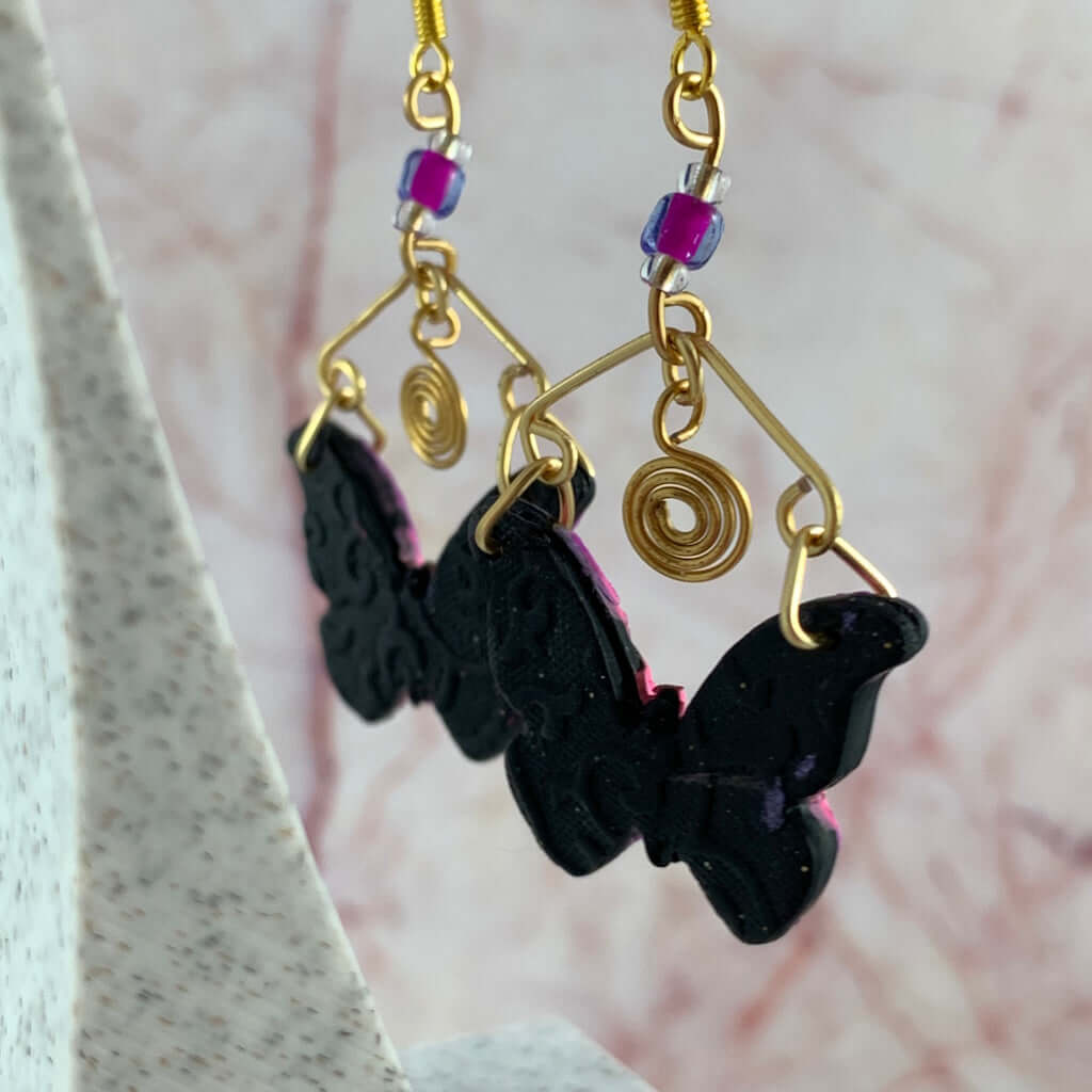 Handmade pink purple butterfly dangle earrings with gold hooks, geometric polymer clay jewellery Australia