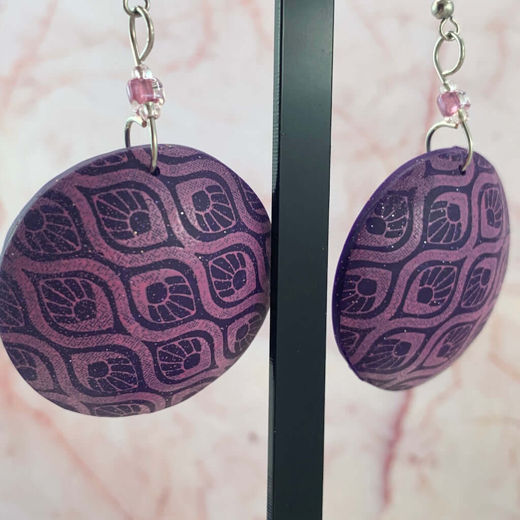 Pink purple pattern earrings with repeating enamel effect design, handmade statement jewellery Australia