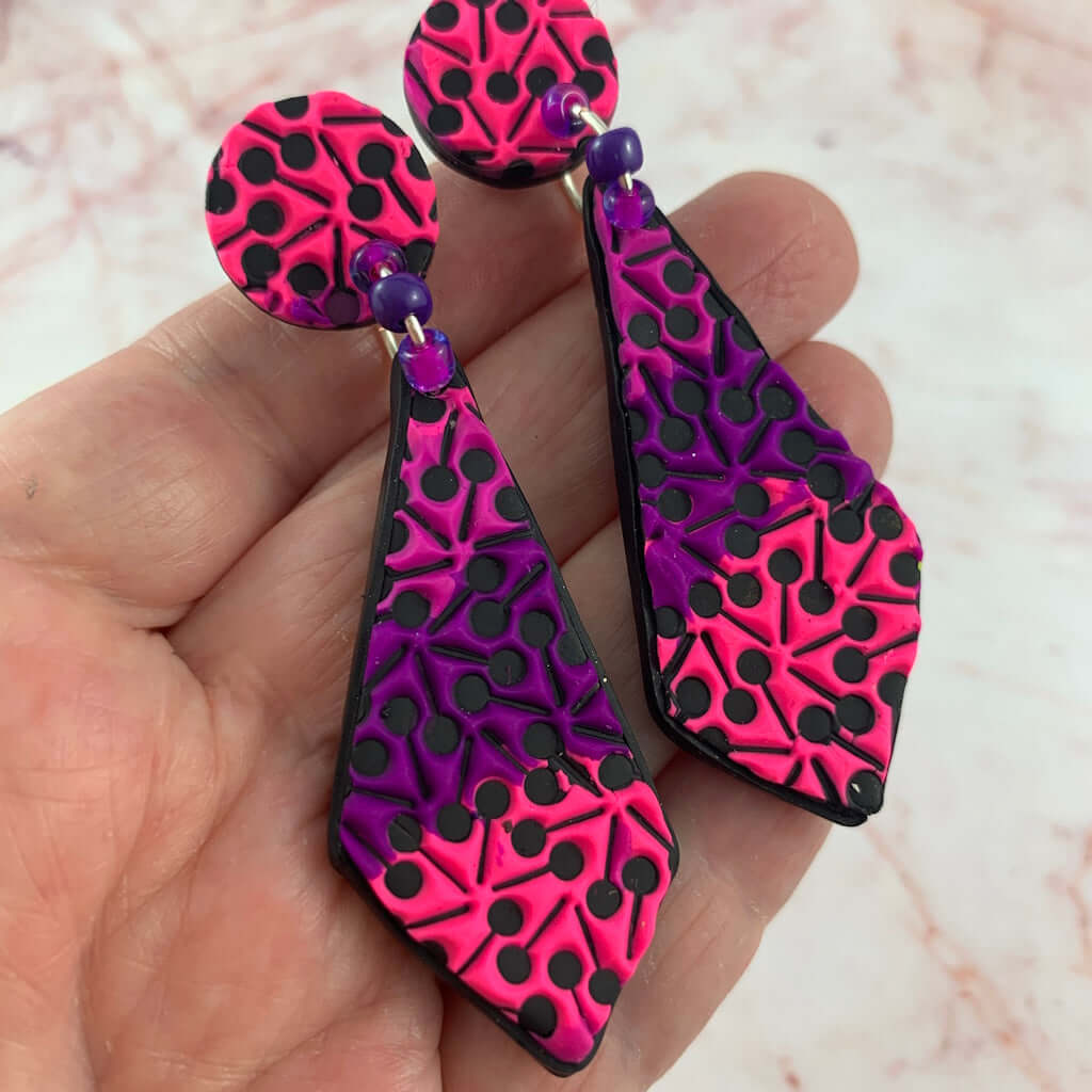 Handmade pink and purple statement earrings with raised polymer clay texture, unique artisan jewellery Australia