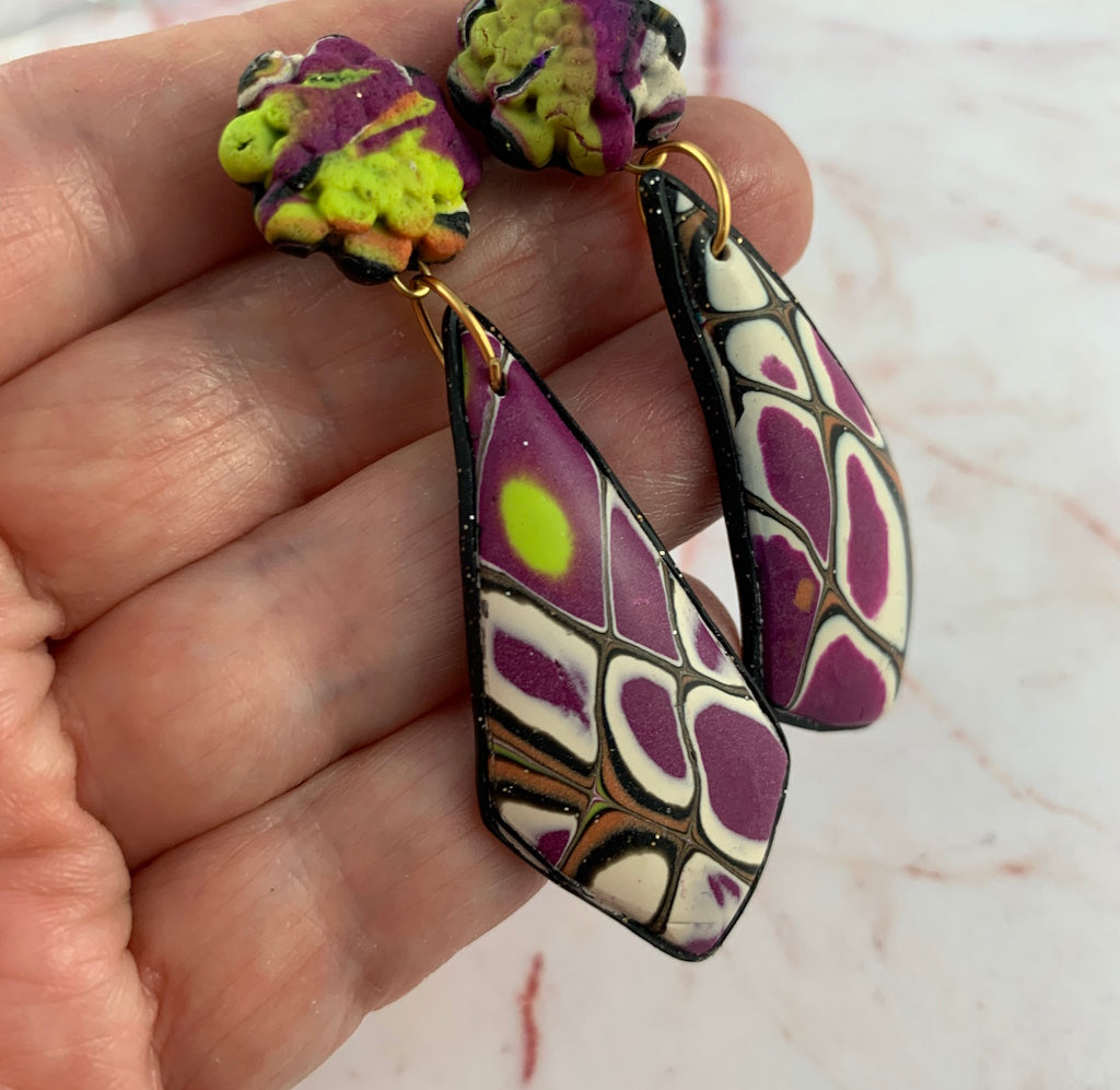 One-of-a-kind handcrafted long polymer clay earrings by award-winning artist Rennique.