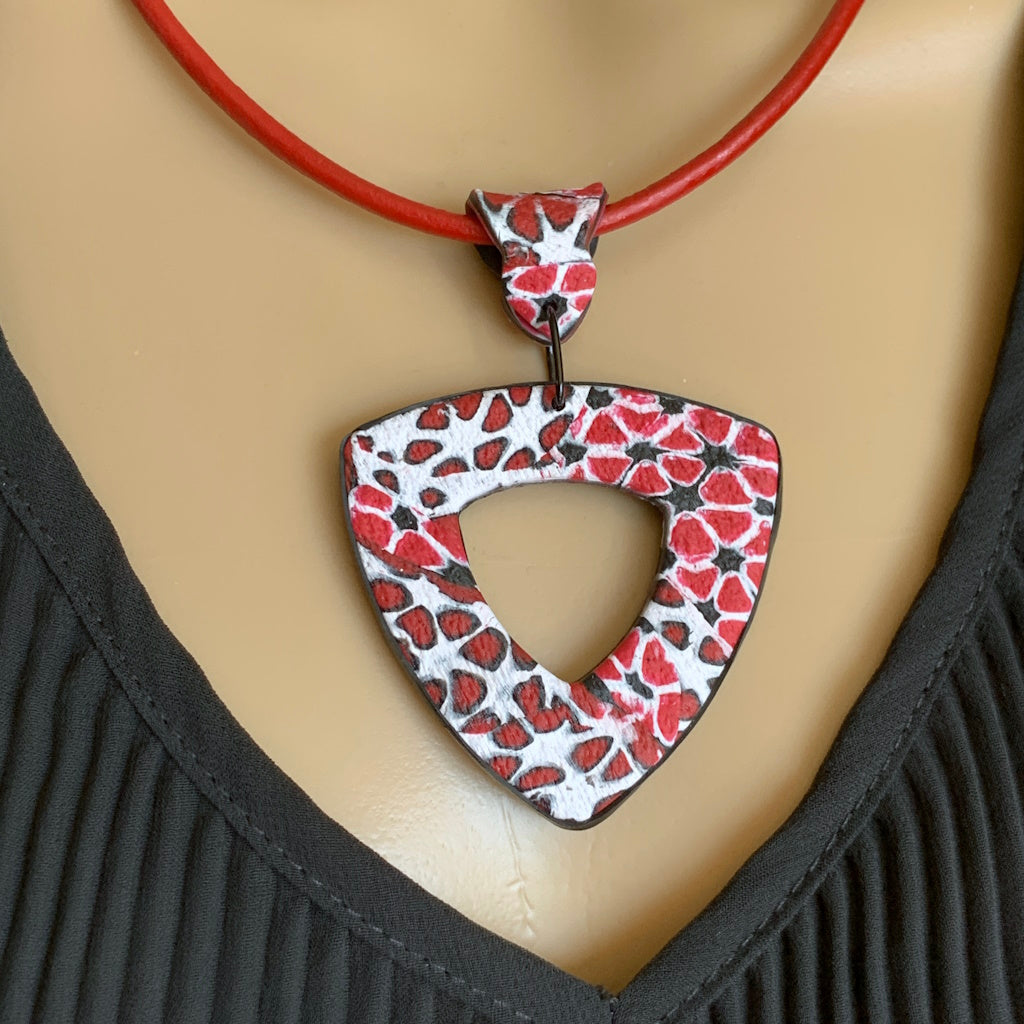 Rennique contemporary geometric pendant necklace red black white wearable artisan jewellery vivid marbled clay design