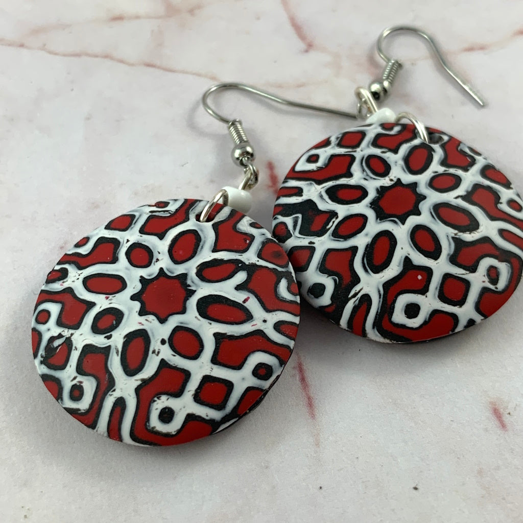 Rennique artisan hand sculpted polymer clay earrings in graphic noir red black white geometric pattern statement design