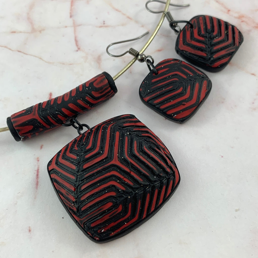 Rennique Australian artist made polymer clay jewellery set in red and black geometric graphic noir design