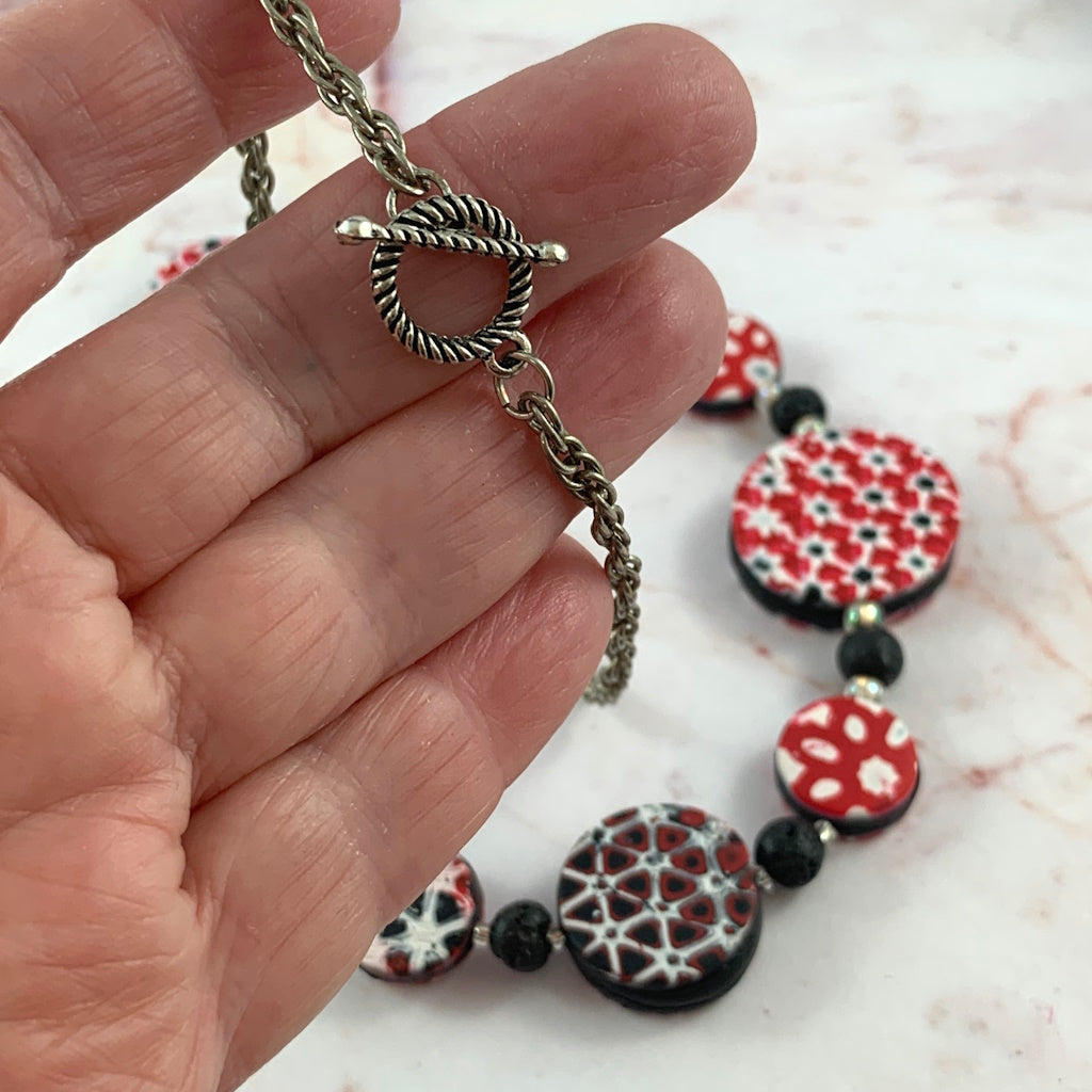 Rennique artisan handcrafted polymer clay necklace with metal clasp detail durable lightweight statement jewellery