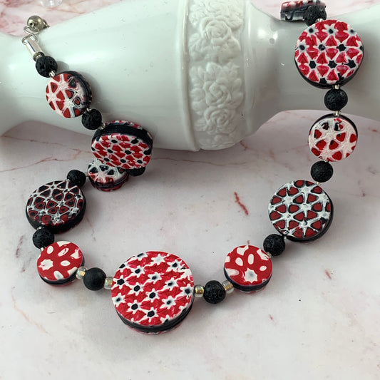 Rennique joyful artisan palette handcrafted polymer clay necklace in red black white tropical abstract geometric design