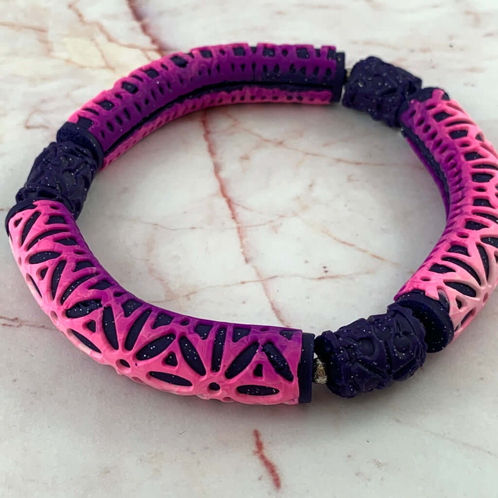 Rennique pink and purple geometric polymer clay bracelet 20cm statement bangle bold handmade jewellery textured design modern artisan style
