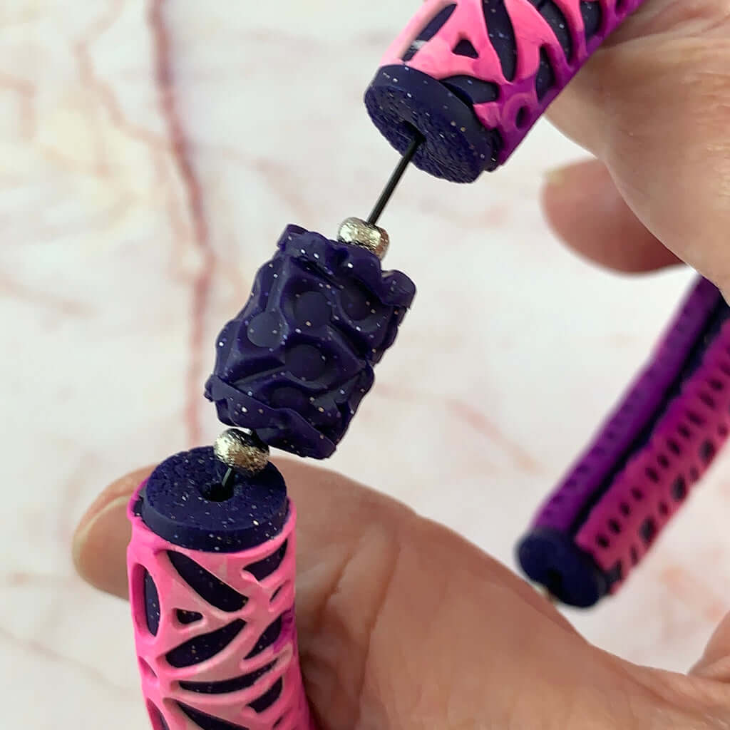 Rennique polymer clay bracelet inside detail stretch cord pink purple bangle comfortable fit handmade jewellery flexible wear design