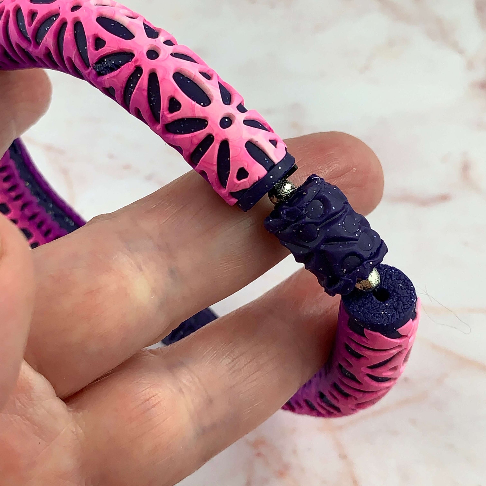 Rennique purple textured beads detail polymer clay bracelet pink geometric pattern handcrafted jewellery unique artisan design