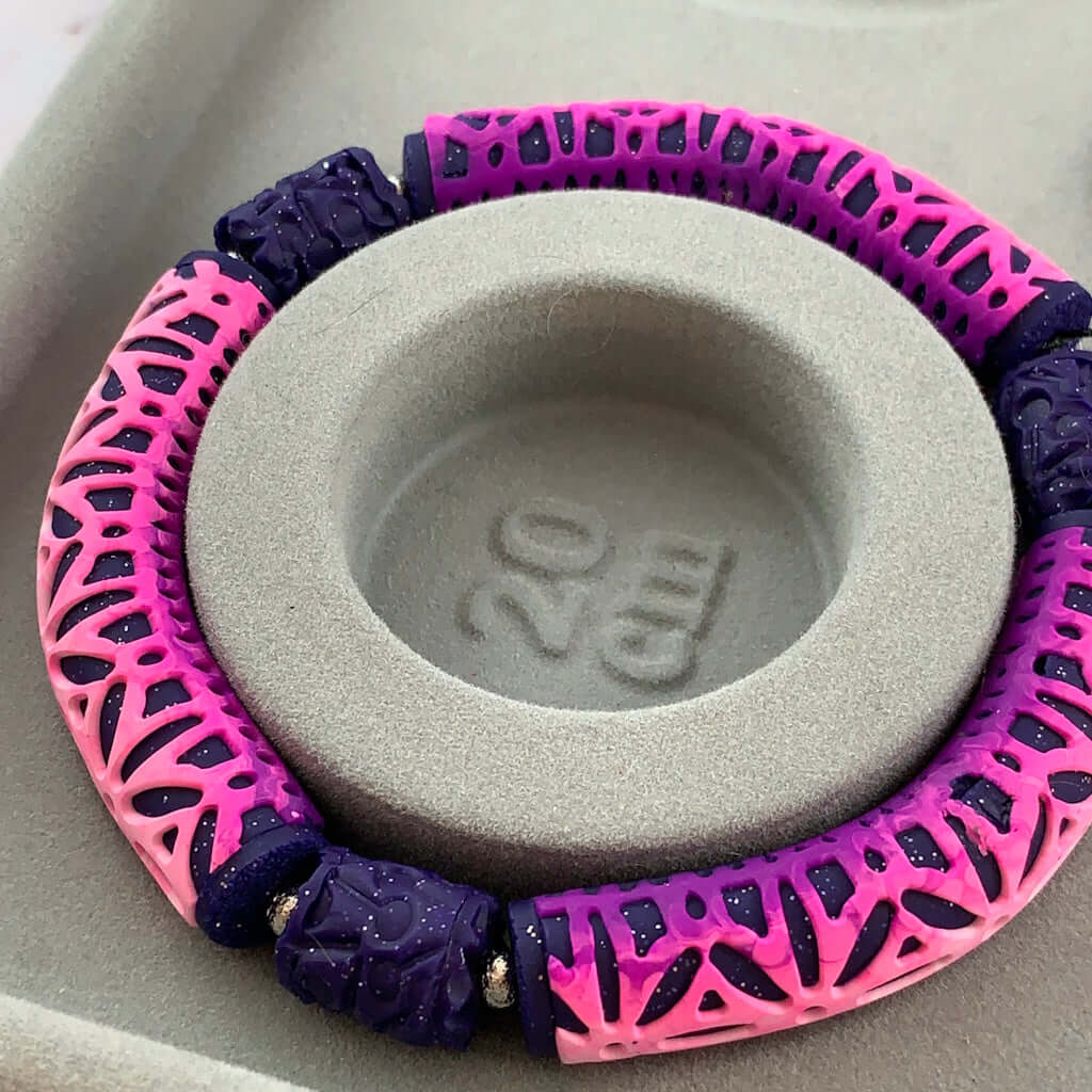 Rennique raised geometric pattern bracelet pink purple polymer clay 20cm bold textured design handmade statement jewellery