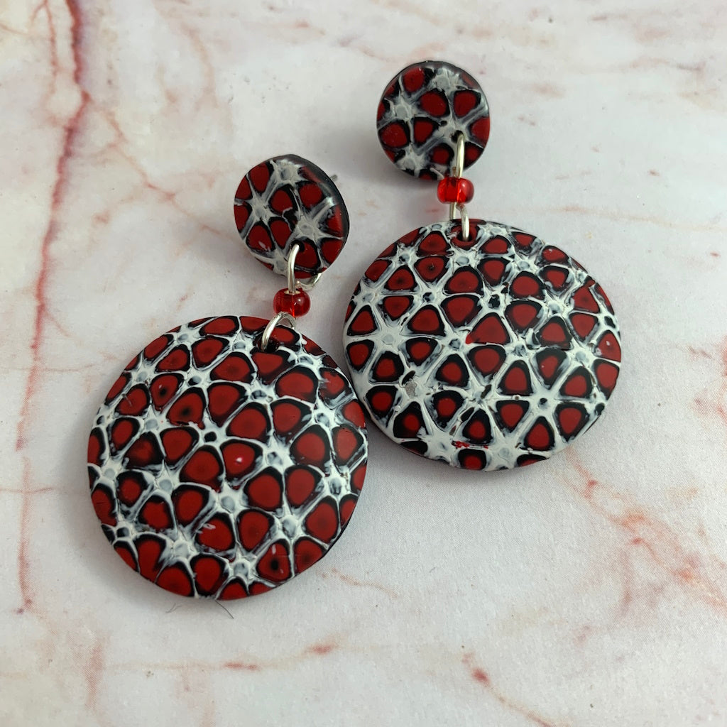 Rennique red black mokume ganae drop earrings designer clay jewelry bold circular pattern artisan handmade statement earrings wearable art