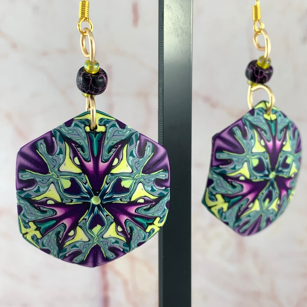 Rennique Studio one of a kind wearable art earrings front and side view showing unique handcrafted design