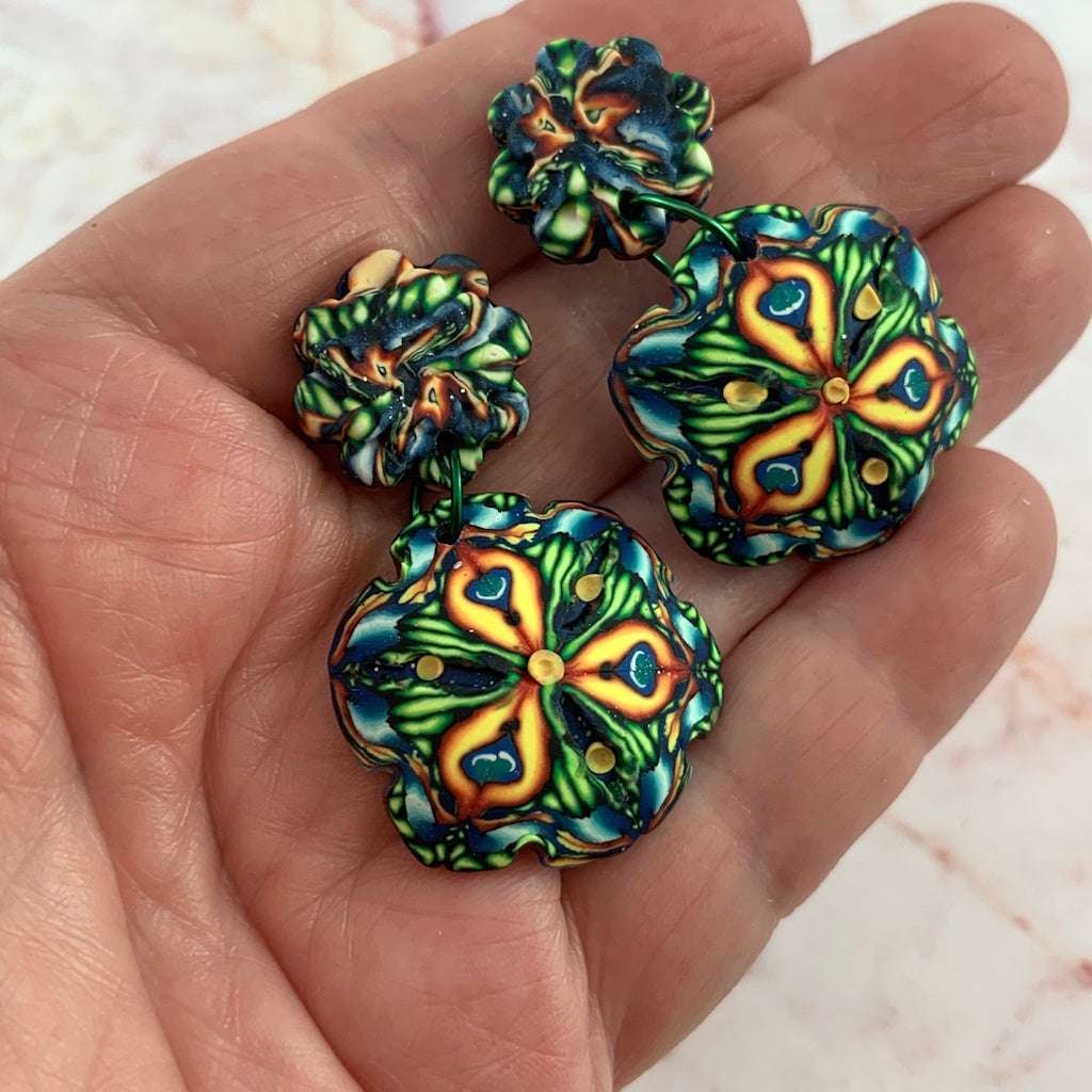 Handmade Australian designer earrings by Rennique featuring unique floral mandala polymer clay statement design.