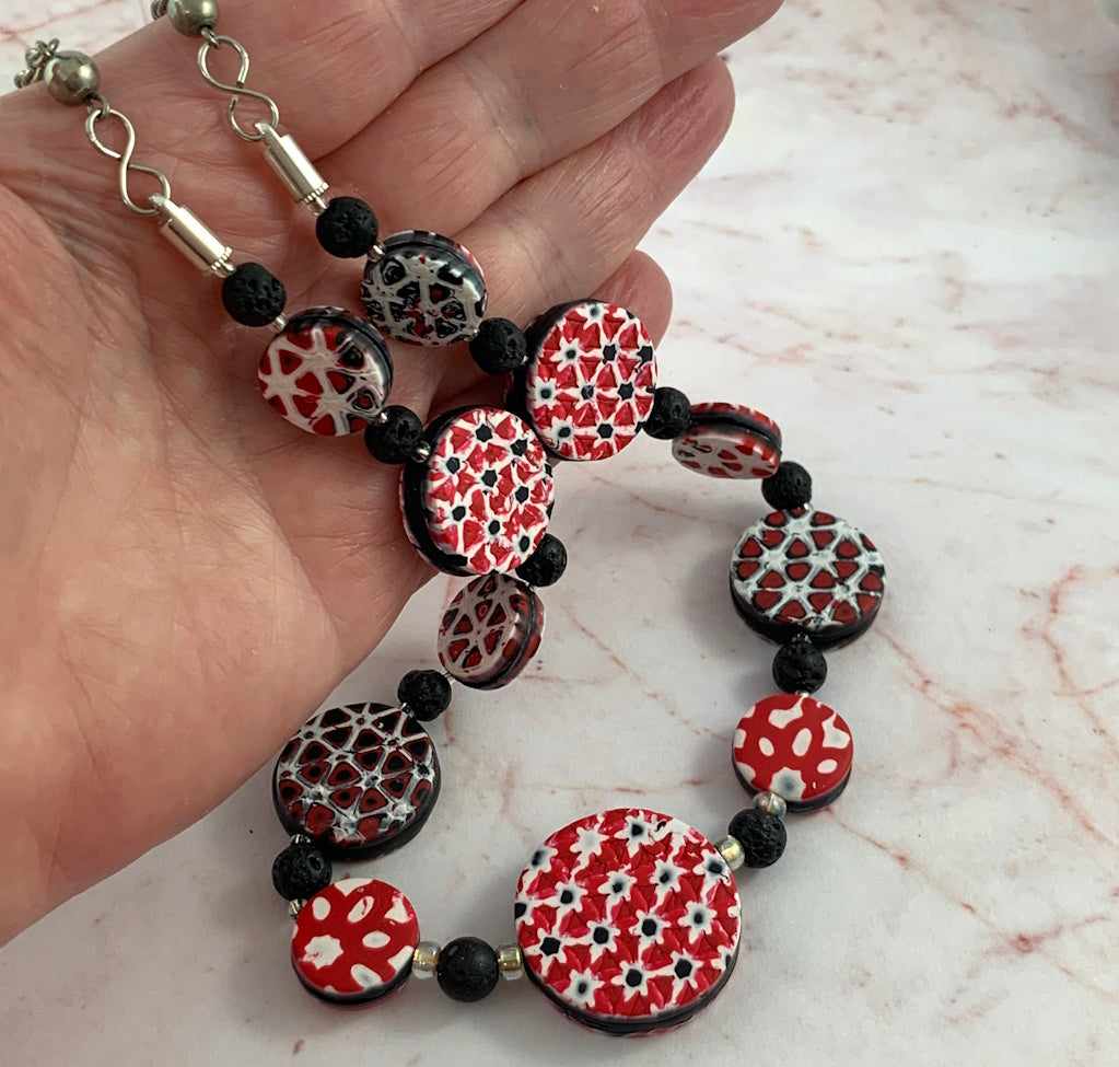 Rennique vivid marbled clay polymer necklace handcrafted red black white geometric beads bold artisan design