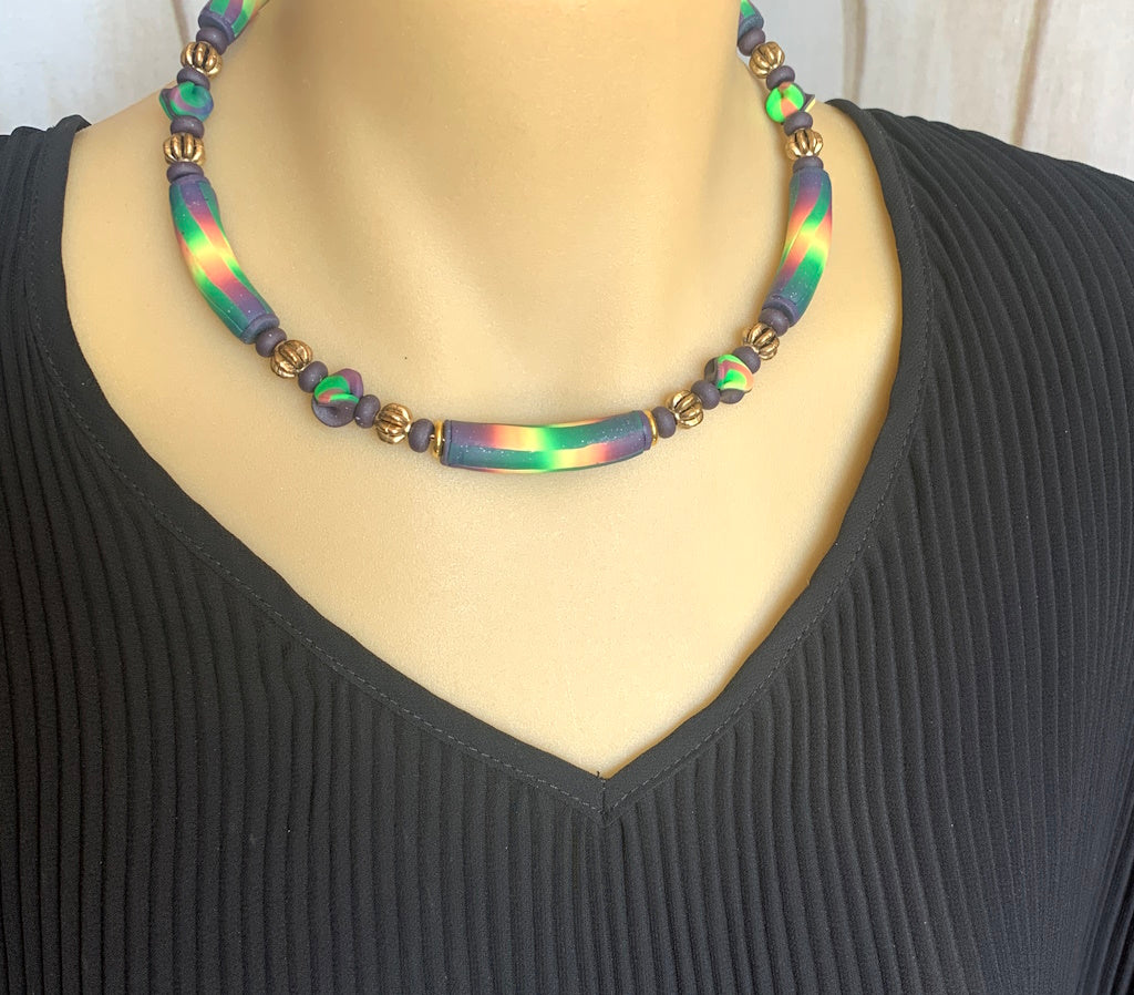 Designer short necklace by Rennique featuring multicolour handcrafted beads and luxury statement styling.