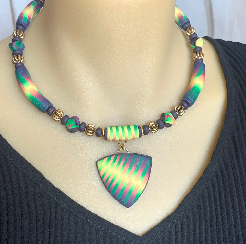 Award winning Rennique handmade short necklace for women with bold multicolour striped beads and elegant artisan finish.