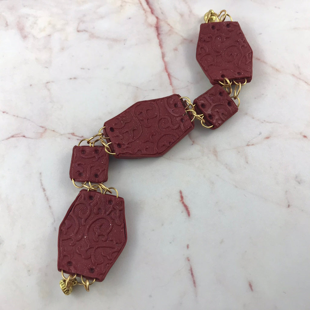 Close-up of the back detail of the Summer Link Bracelet with handcrafted polymer clay texture.