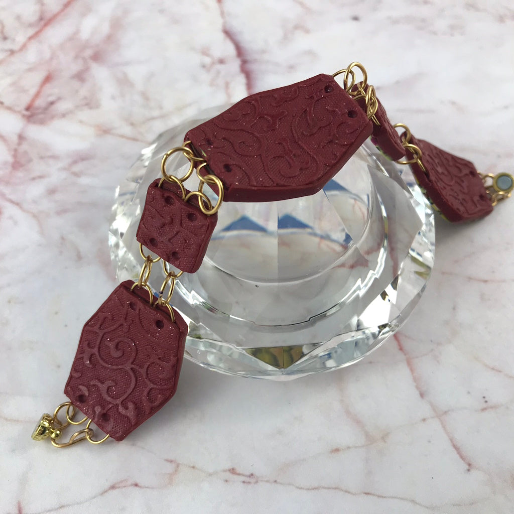 Close-up of the back view of Summer Link Bracelet highlighting handcrafted texture and layered clay finish.