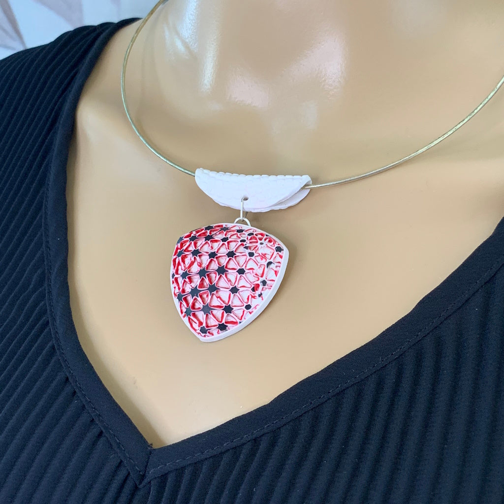 Bold red statement pendant necklace handmade polymer clay jewelry worn on model