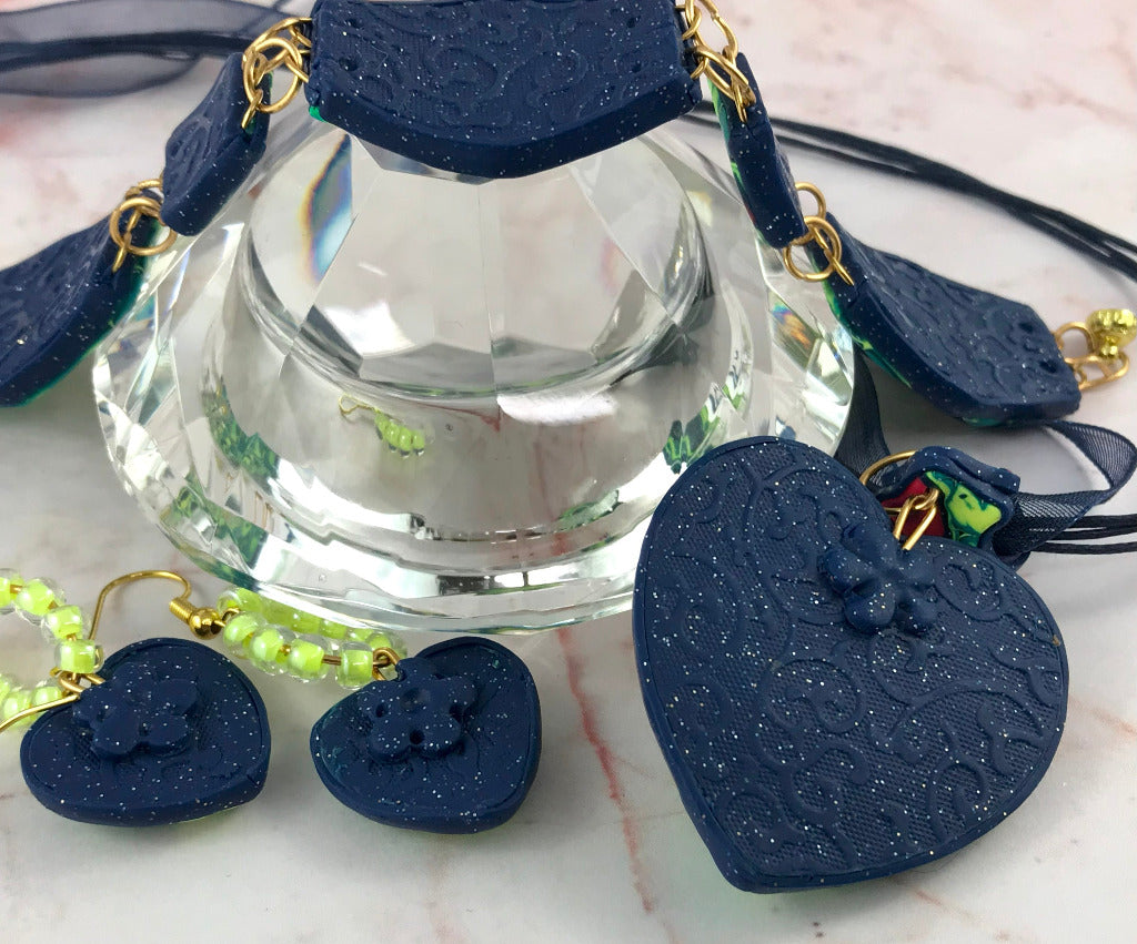 Back view of handmade heart pendant showing textured navy polymer clay finish and artisan detailing, unique jewellery Australia