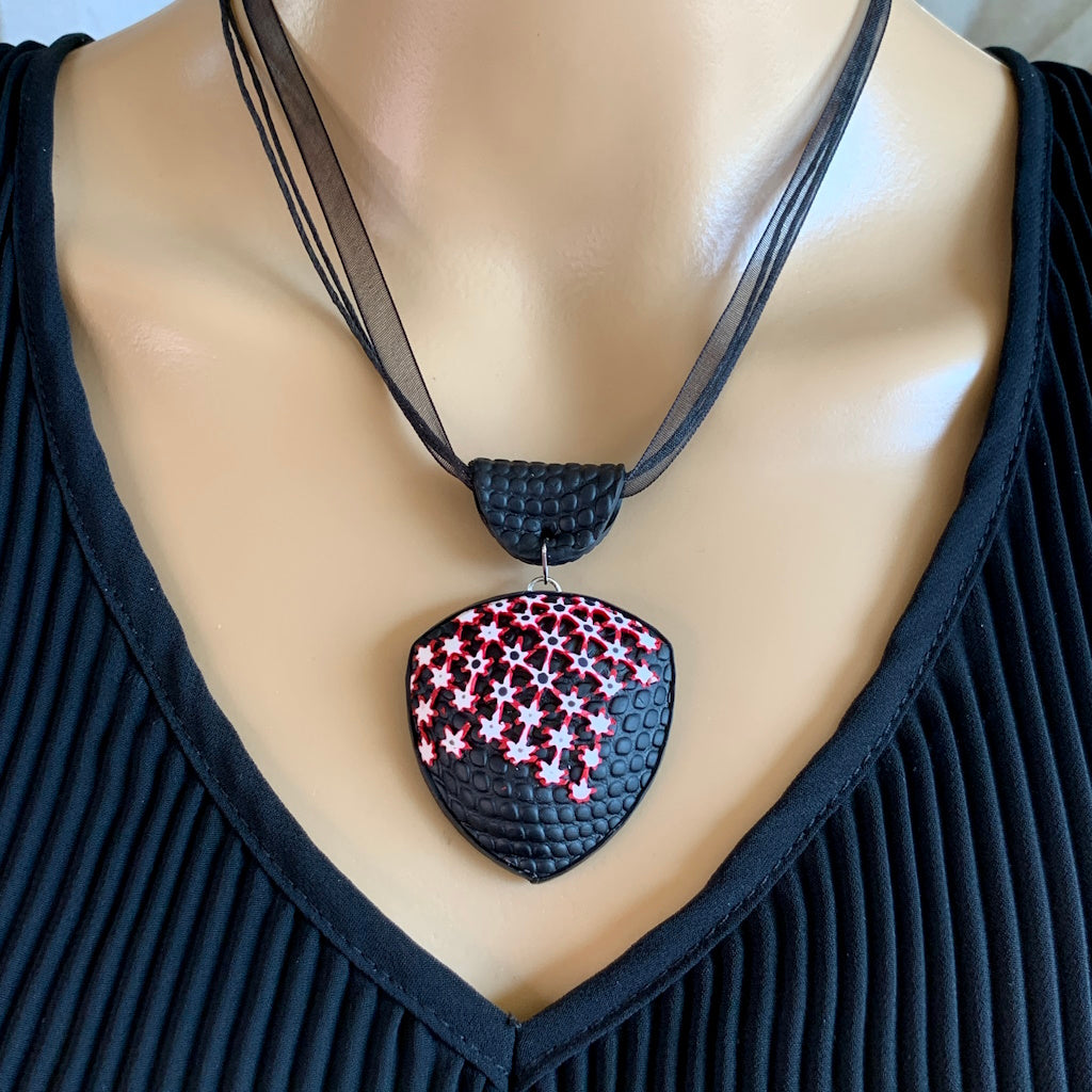Designer black statement necklace with red white raised pattern Australian handmade jewellery