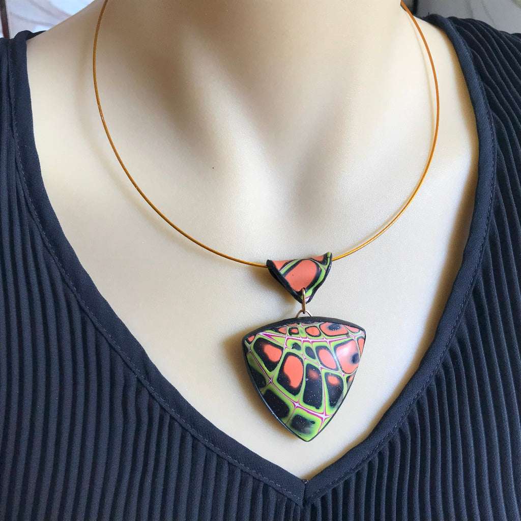 One of a kind polymer clay jewellery set featuring bracelet, pendant necklace and matching earrings with bold abstract pattern, handcrafted artisan jewellery Australia
